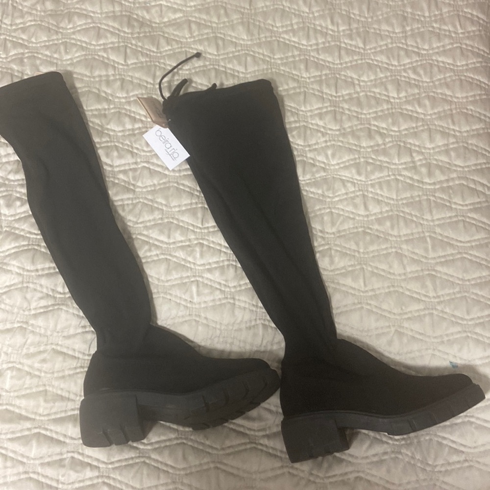Boots black, New. Brasilian designer. Size US 6 Eu 7 Bra 35